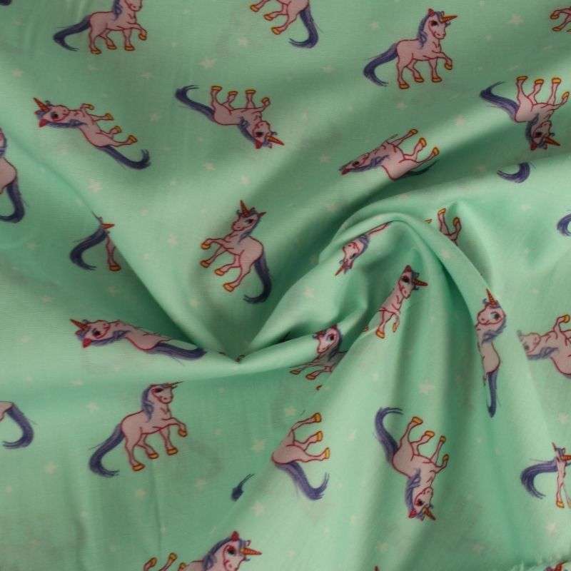 Tissu popeline de coton vert clair motif licorne