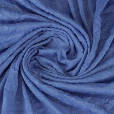 Tissu jersey flammé froissé bleu denim vendu au coupon
