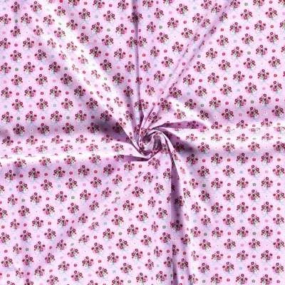 Tissu coton Popeline fleuri sur fond rose