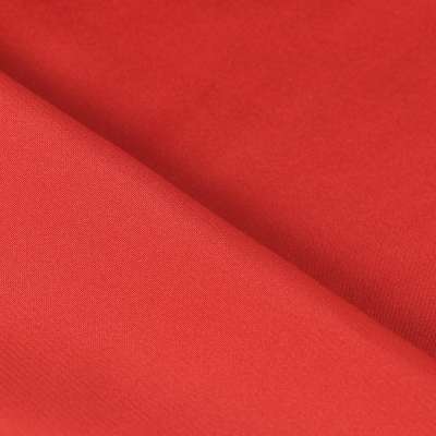 Tissu satin polyester uni rouge toucher peau de pèche