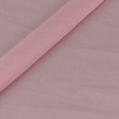 Tissu résille uni couleur rose bébé