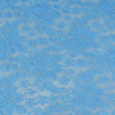 Tissu dentelle motif fleurs uni bleu