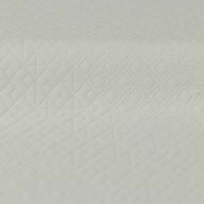 Tissu matelassé gaufré motif géométriques uni écru vendu au coupon