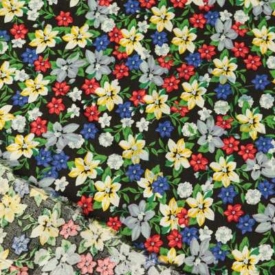 Fibranne viscose motif fleuri multicolore fond noir vendu au coupon