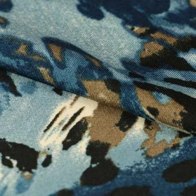 Tissu venezia lycra motif tie and dye ton bleu