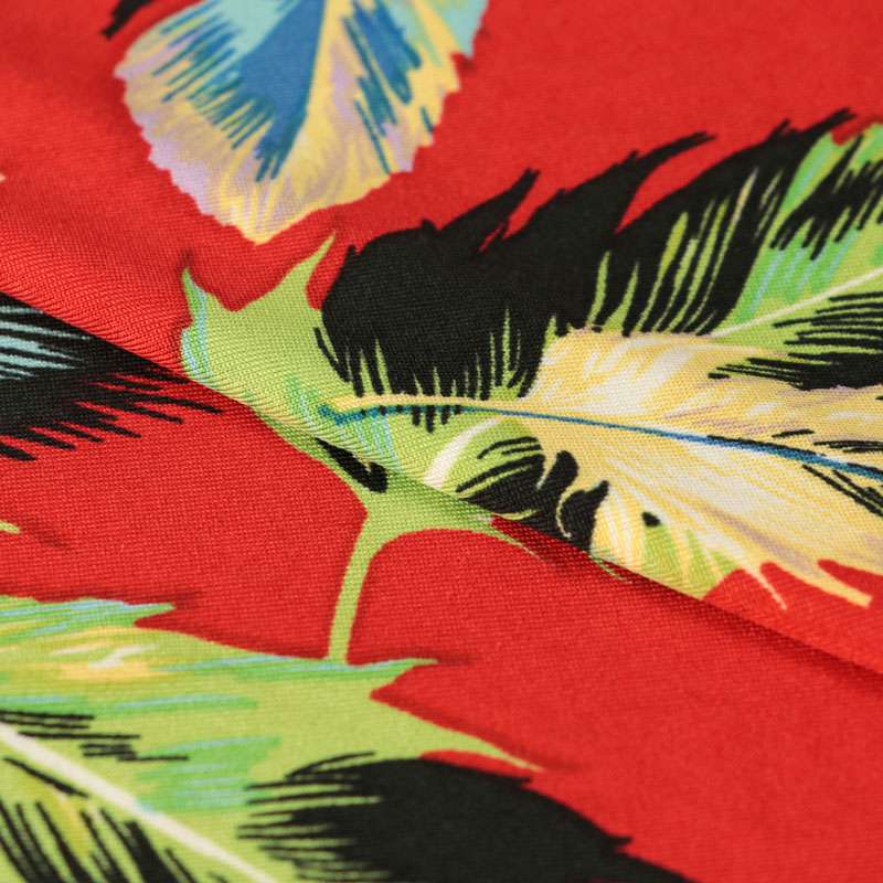Tissus venezia lycra maillot de bain imprimé plumes multicolores fond rouge