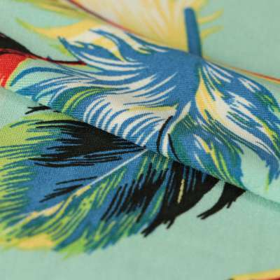 Tissus venezia lycra maillot de bain imprimé plumes multicolores sur fond turquoise
