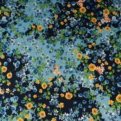 Tissu venezia lycra maillot de bain motif champs de fleurs sur fond bleu