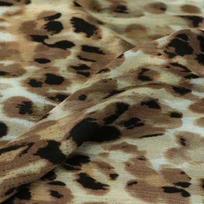 Fibranne viscose motif léopard sur fond écru vendu au coupon