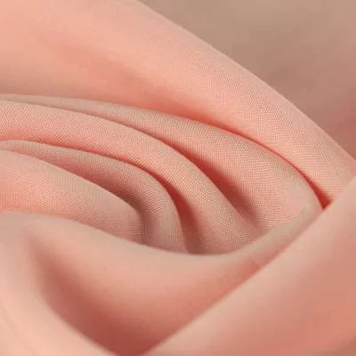 Tissu Voile de viscose uni rose bébé