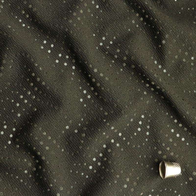 Tissus maille zigzag troué noir vendu au coupon