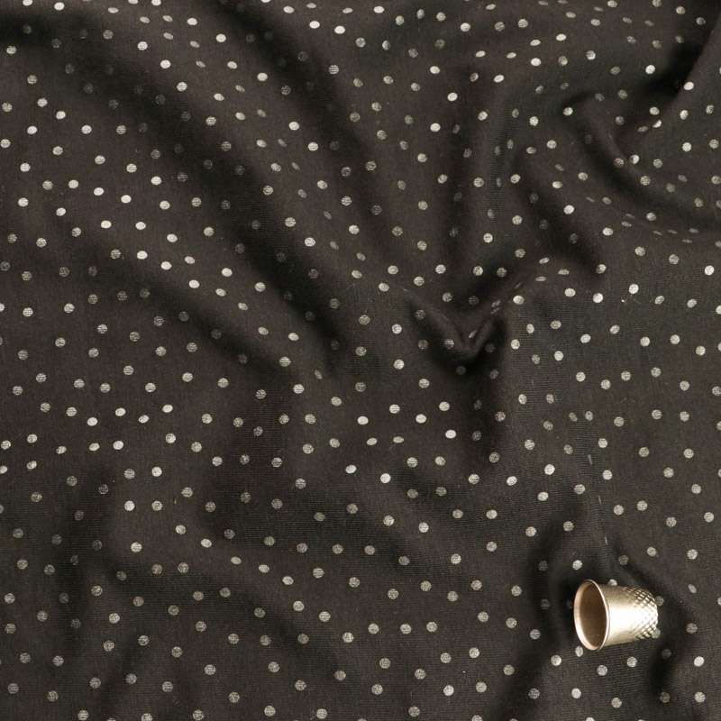 Jersey Coton noir motif pois vendu au coupon