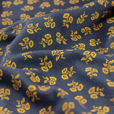 jersey piqué imprimé fleurs dorées sur fond marine