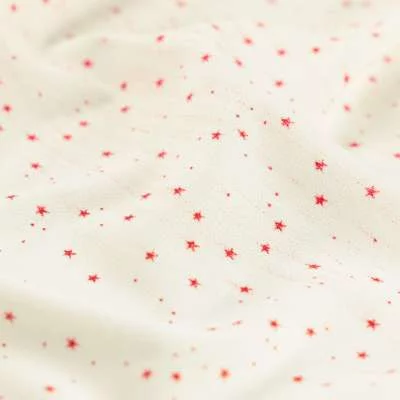 Tissu crêpe imprimé étoiles rouge sur fond blanc