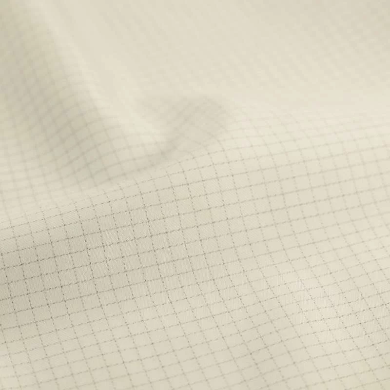 Tissu popeline coton blanc motifs minicarreaux vendu au coupon