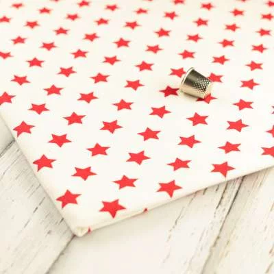 Tissus gabardine de coton blanc étoiles rouge