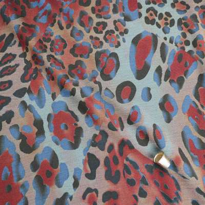 Tissus maille bleu et bordeaux imprimé légère motifs léopard vendu au coupon
