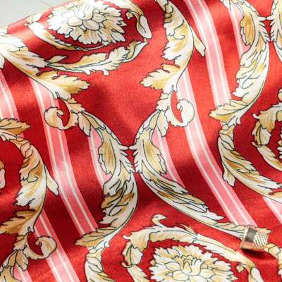 Tissu satin polyester imprimé sur fond brique