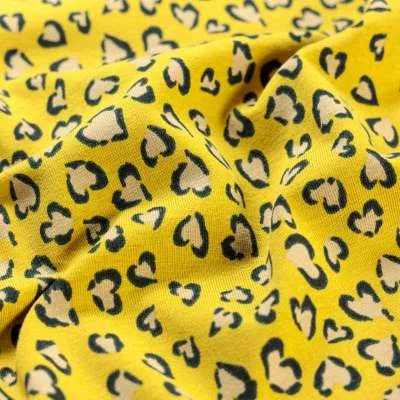 Jersey coton imprimée cœur fond jaune