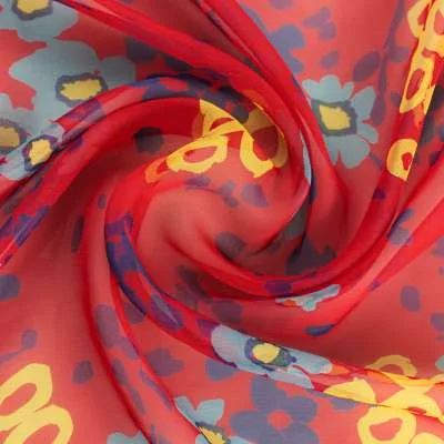 Tissu mousseline de soie motif fleurs sur fond rouge de haut gamme
