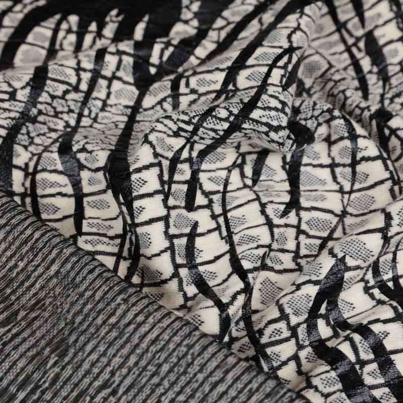 Tissu jacquard gaufré imprimé zébré vendu au coupon