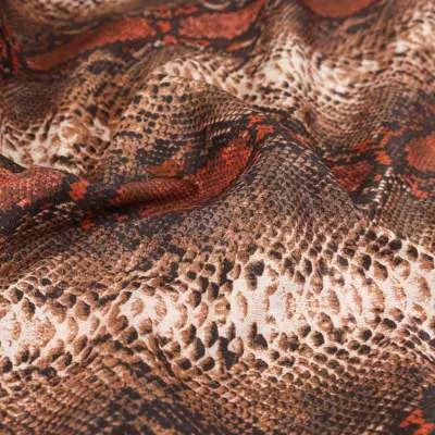 Tissu scuba imprimé peau de serpent camel