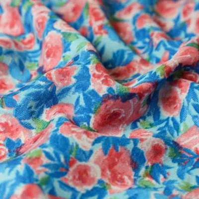 Tissu Microfibre Wool peach motif floral rouge sur fond bleu