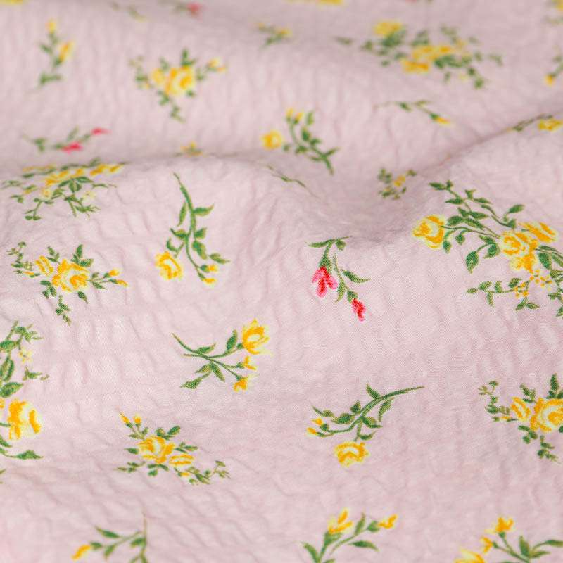 Tissu seersucker motifs fleurs blanches fond  vendu au coupon