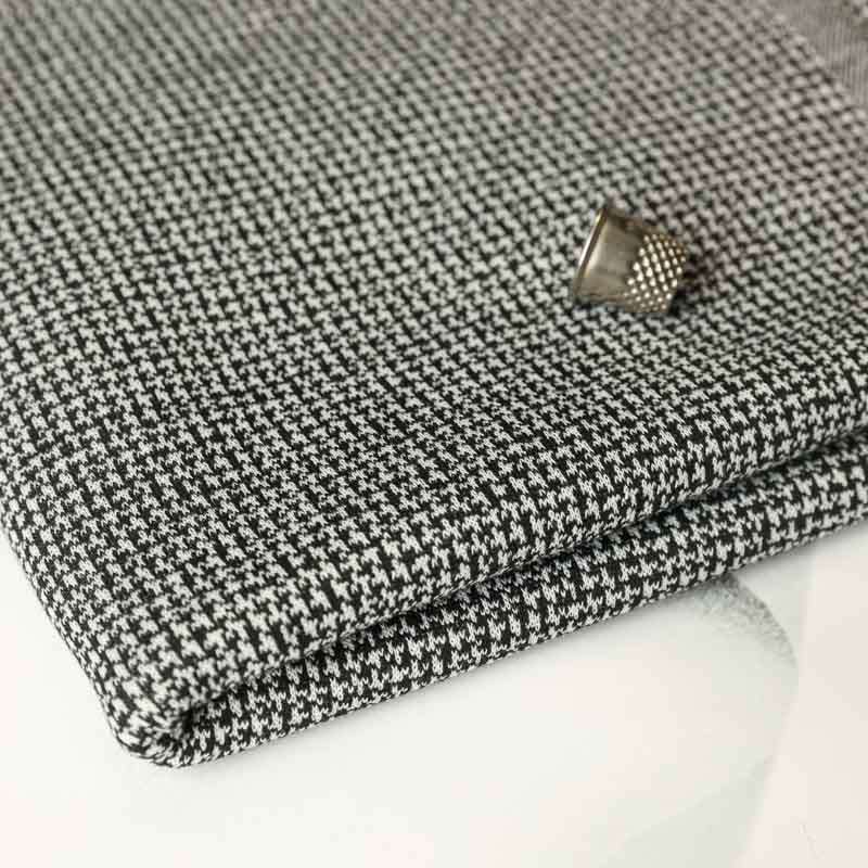 Tissu jacquard gris Motif pied de puce Vendu Au Coupon