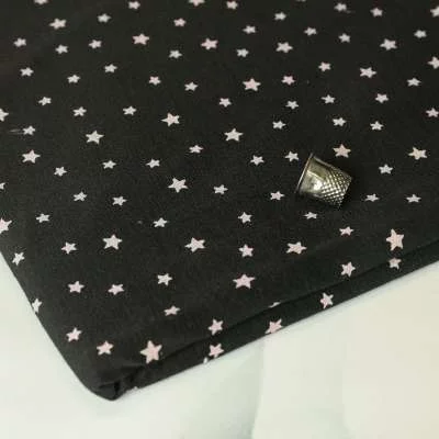 Jersey Polyester noir motif étoiles