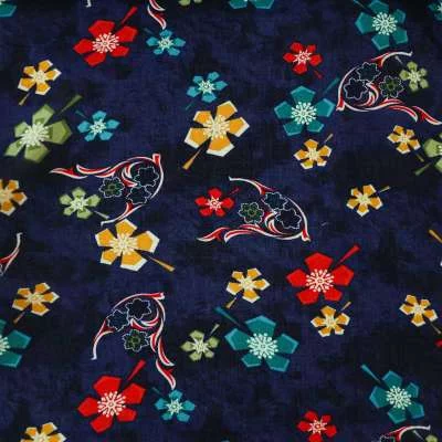 Tissu viscose fond marine motif floral pour robes de plage vendu au coupon