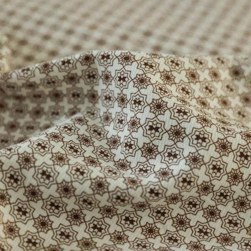 Tissus jacquard beige motif géométriques