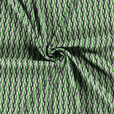 Tissu viscose extensible en chaîne et tram vert motif géométrique vendu au coupon