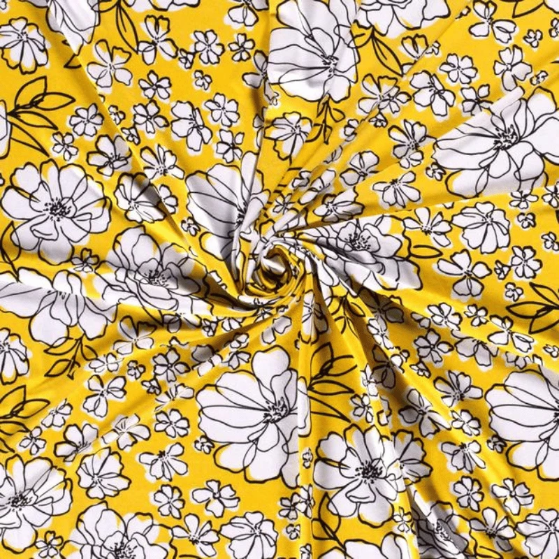 Tissu jersey de viscose jaune imprimé fleurs