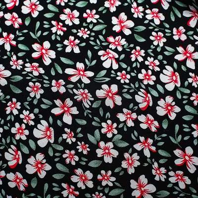 Tissu viscose noir de haute qualité motif fleurs de jasmin vendu au coupon
