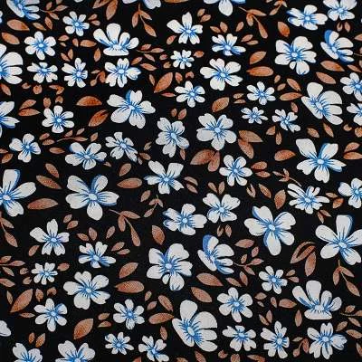Tissu viscose noir de haute qualité motif fleurs de jasmin bleu vendu au coupon