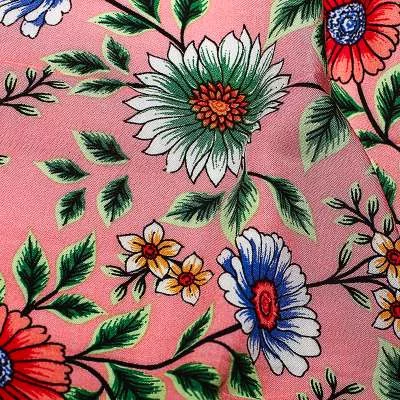 Tissu viscose de haute qualité fond rose motif fleurs
