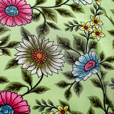 Tissu viscose de haute qualité fond vert motif fleurs vendu au coupon