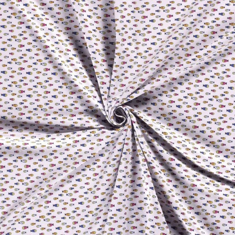 Tissu jersey coton motif poisson sur fond gris clair