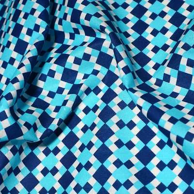 Tissu Popeline de Coton imprimé géométrique aqua bleu vendu au coupon parfait pour les débutants en couture