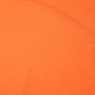 Tissu jersey polyester uni orange Commandez-le en ligne dès maintenant.