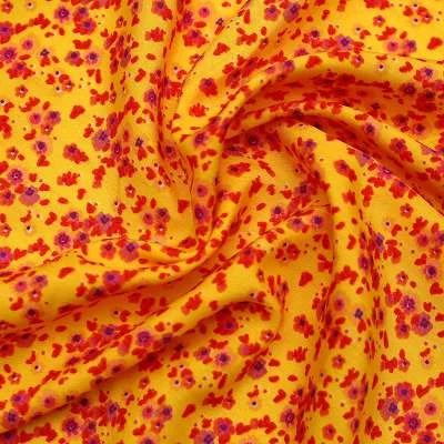 Tissu crêpe polyester motifs fleurs assorti d'une touche de couleur à vos créations