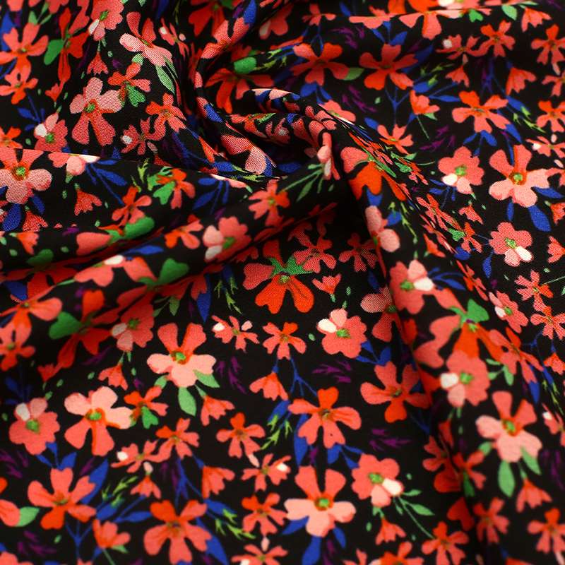 Tissu crêpe polyester motifs jasmin