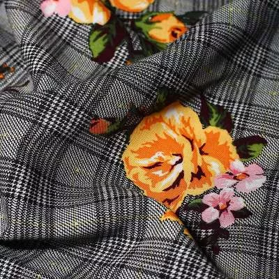 Tissu viscose motif prince de galle et roses jaune le choix de la mode.