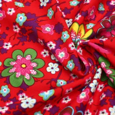 Tissu jersey coton motif fleuri- rouge