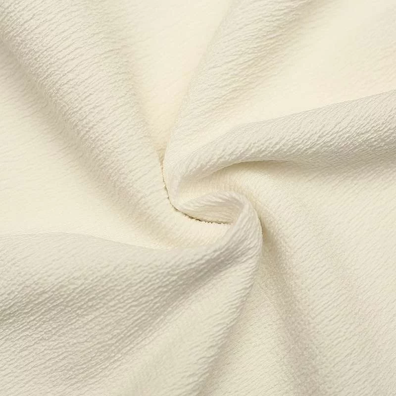 Tissu Crépon Teinture Extensible Uni - Confort et style réunis