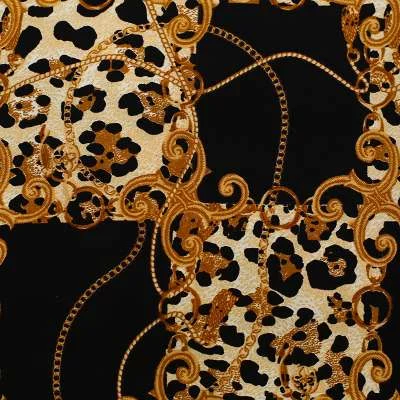Tissu satin motif léopard et chaînes : un style audacieux