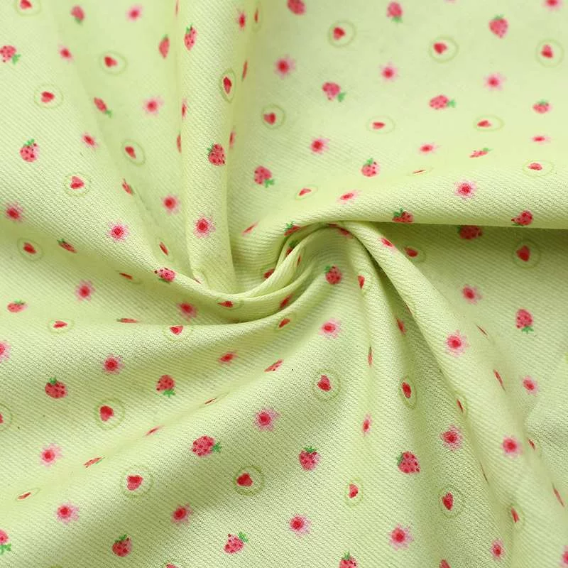 Tissu Coton Imprimé Arty Cotillons Multicolores sur fond Vert