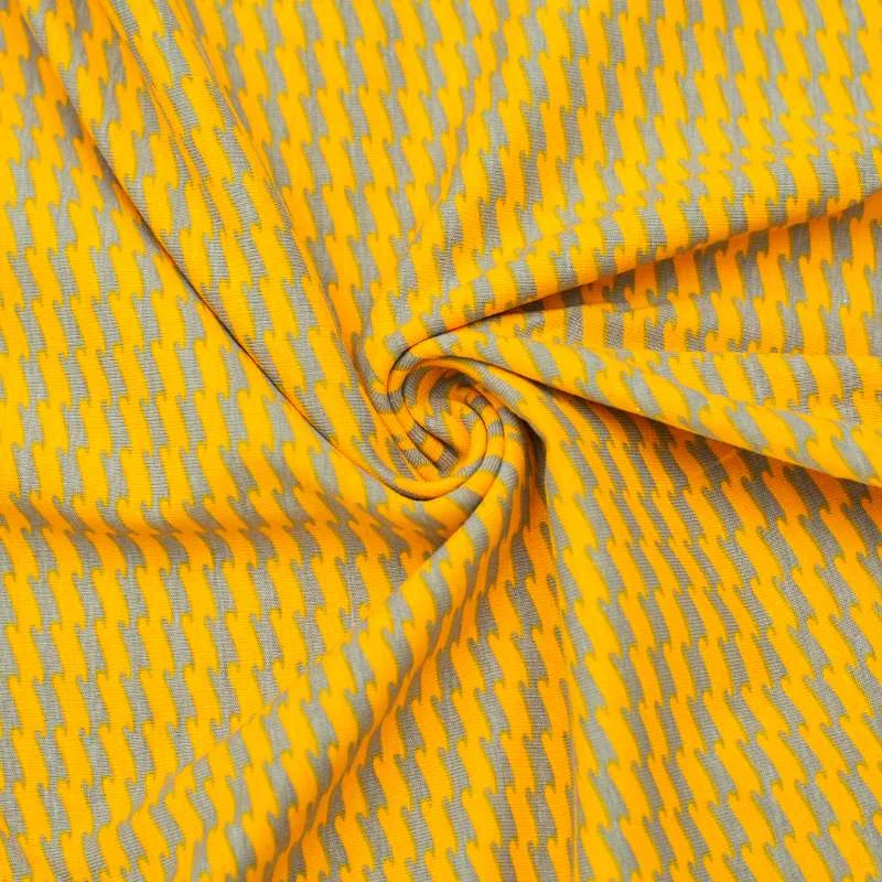 Jersey Coton au motif géométrique sur fond jaune. Qualité supérieure garantie !