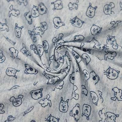 Tissu Jersey Coton Chiens Bleu. Son design ludique et sa qualité